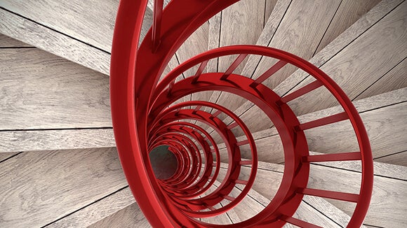 banner escada em caracol com corrimão vermelho