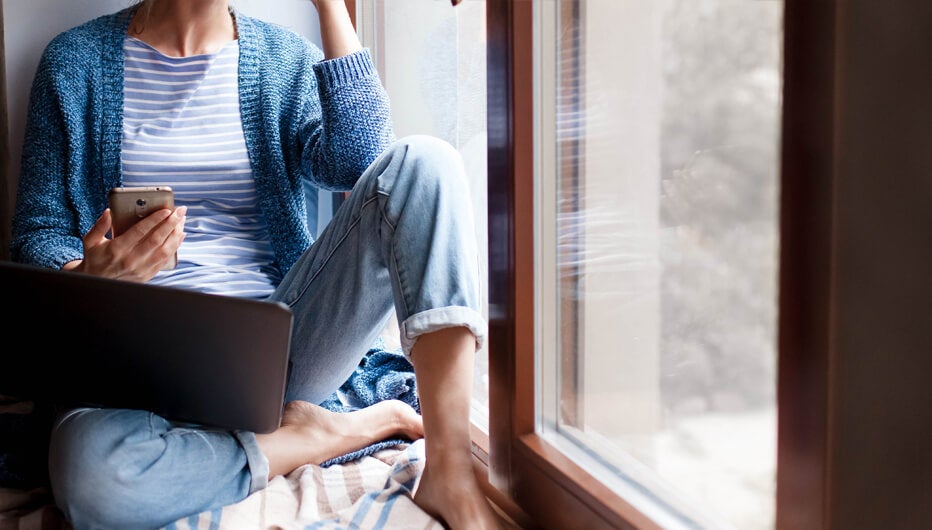 woman-sitting-at-window